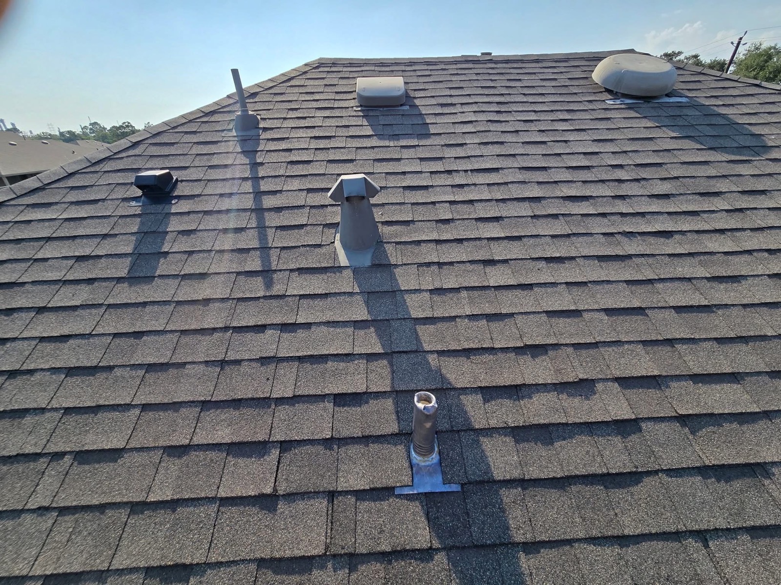 Finished shingle roof installed by Reynas Roofing Repair